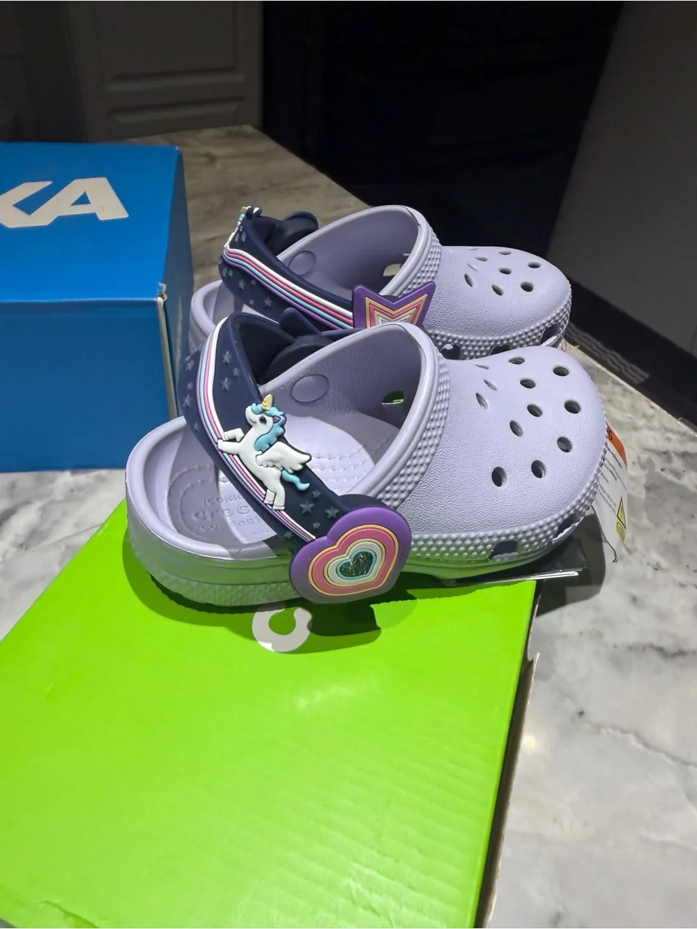 CROCS Kids Classic Clog in Lavender with Glow Star Strap